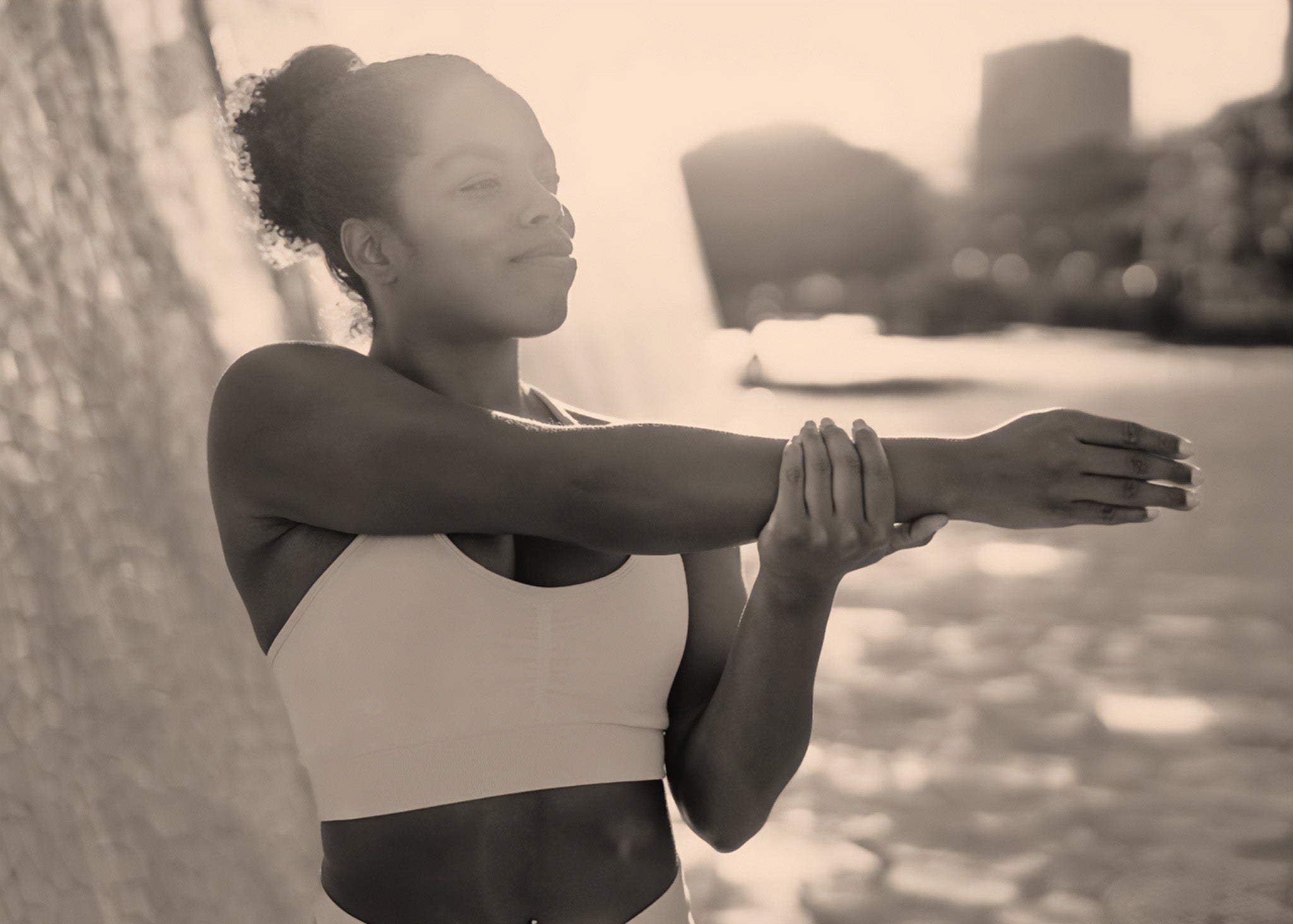 Image of a BOD customer getting ready, stretching for a run.