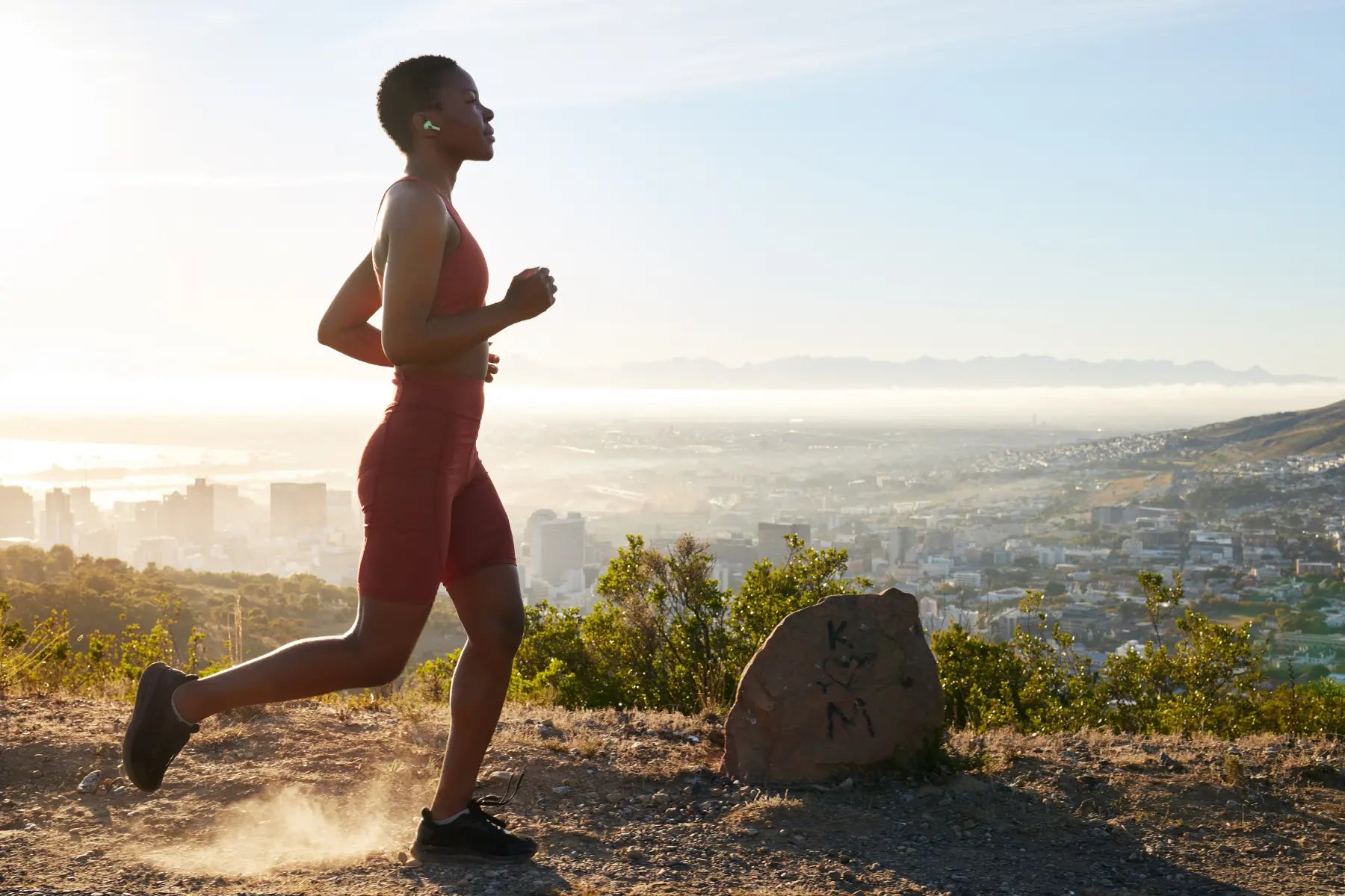 DEXA scan body fat athlete running uphill to improve fitness before body composition testing