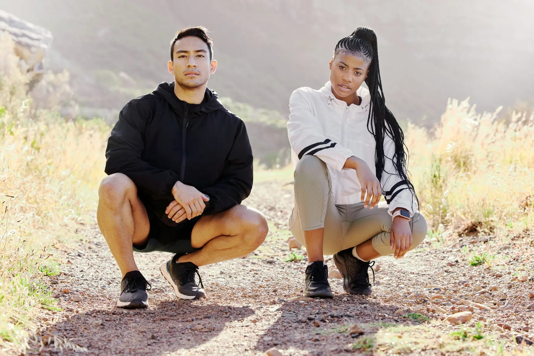 Gut health and brain connection illustrated by two athletes pausing after exercise, highlighting the mind-body wellness relationship.