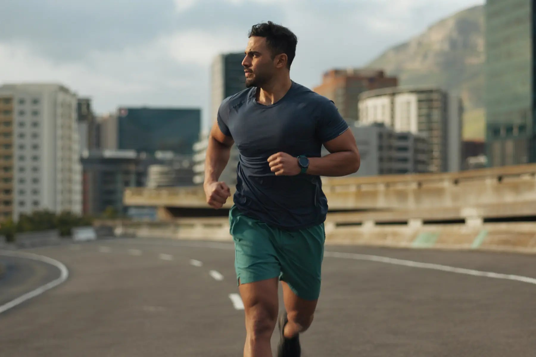 Technology in disease prevention supports runners like the man jogging through a cityscape.