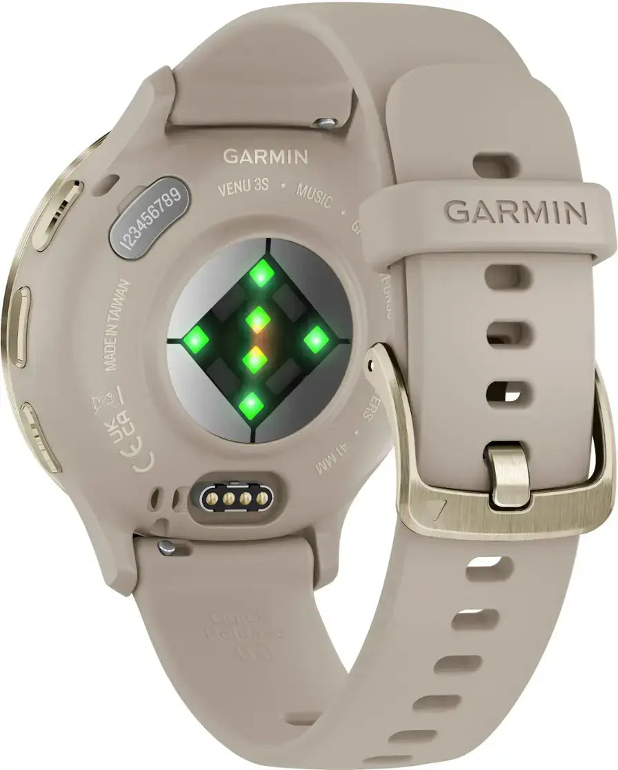 Beige Garmin smartwatch with a green digital display on a white background