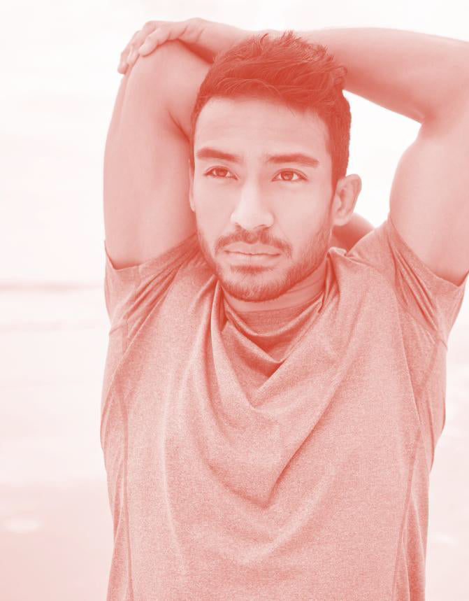 BOD customer wearing a sleeveless shirt with a blurred background