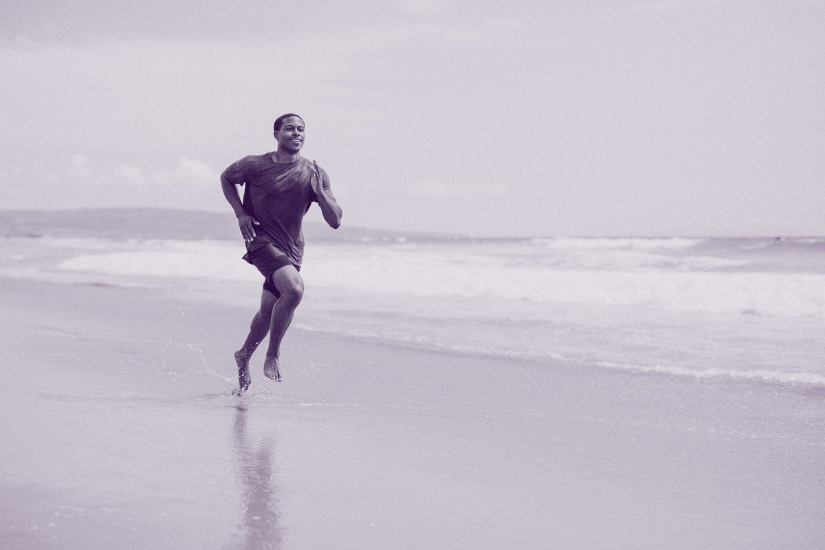 Athlete running on a treadmill during a VO2 Max test
