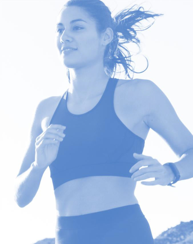 Woman running with a blue filter applied
