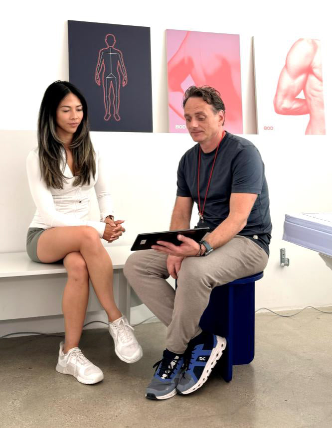 BOD coach and customer reviewing DEXA scan results, at the BOD store in Venice, CA