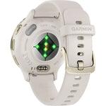 White Garmin smartwatch with a green digital display on a white background
