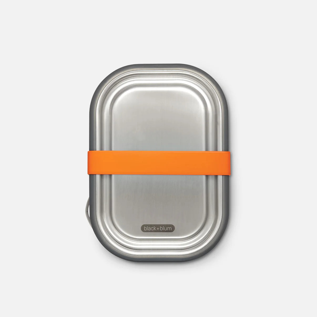 Metal lunch box with an orange band on a light gray background