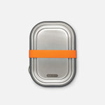 Metal lunch box with an orange band on a light gray background
